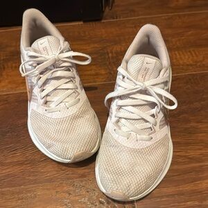 Nike downshift, tennis shoes.  Blush pink color gently used.